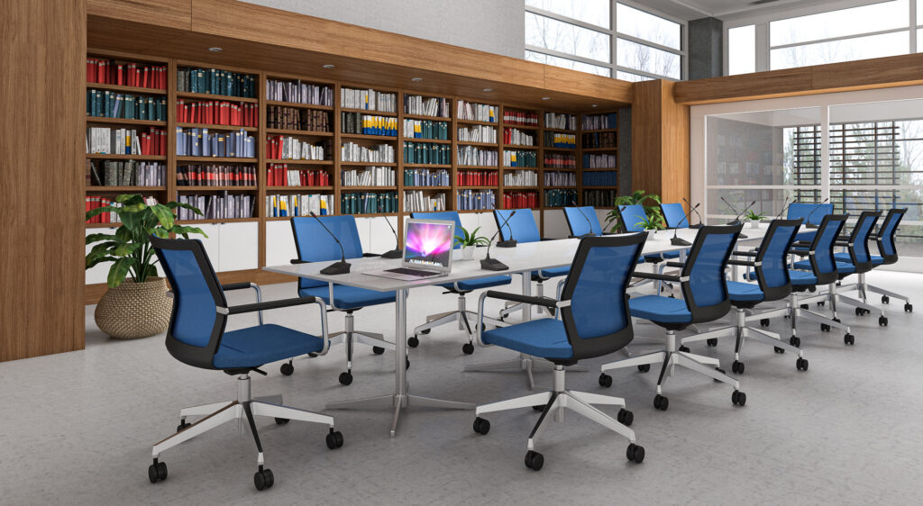 Blue conference room chairs arranged neatly in front of a bookcase, creating a professional and inviting environment for meetings and discussions.